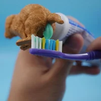 Funny Dog Pooping Toothpaste Squeezers Cartoon Toothpaste Cap Squeezer Novelty Gift For Kids Adult Portable Bathroom Accessories 1