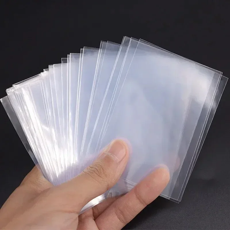 

50/100Pcs Pokémon 65*90mm Transparent Collection Card Film Card Game Protector Sleeves Card ID Protector Bag Waterproof Storage