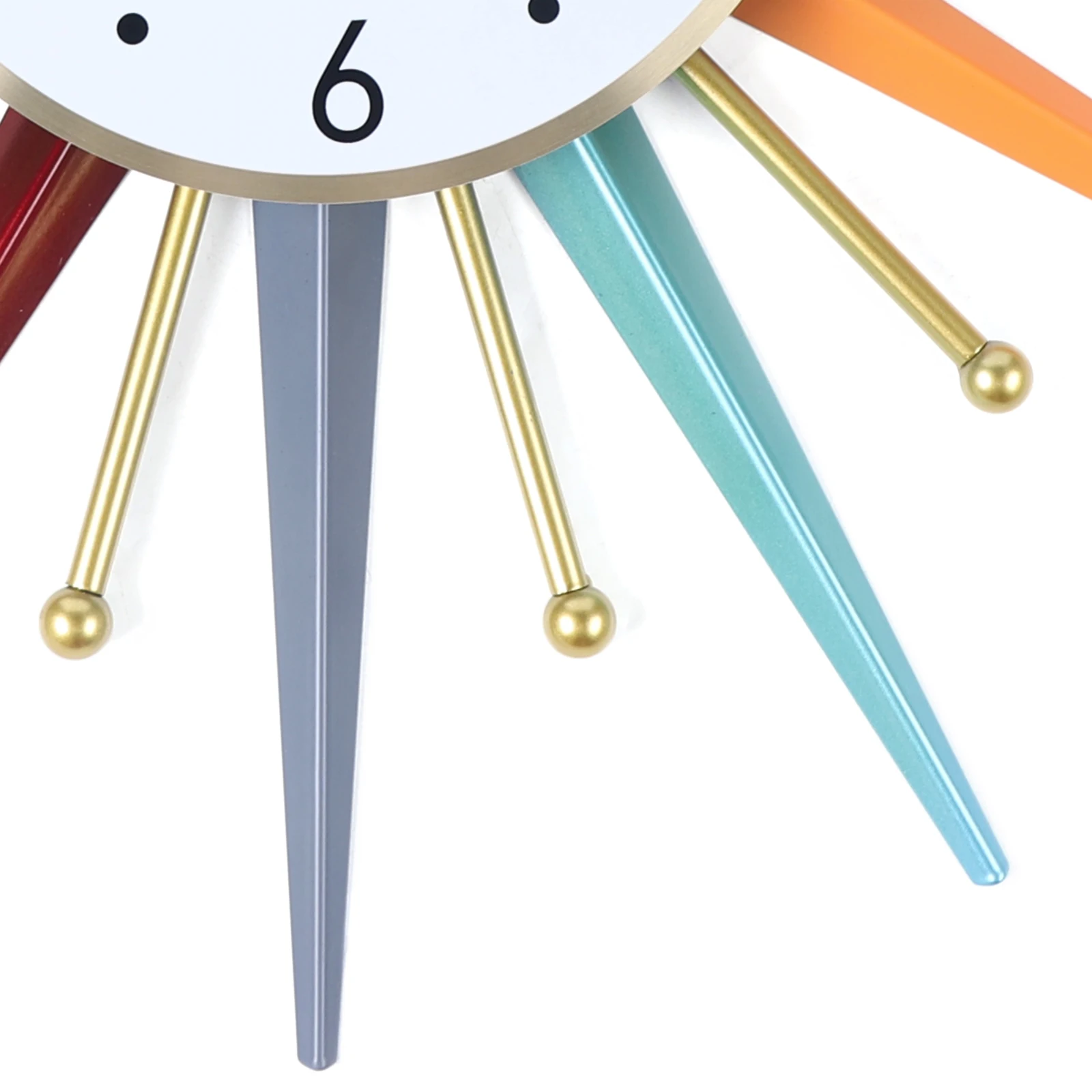A close-up of the Sunburst Wall Clock featuring vibrant triangular spokes and gold spheres radiating from the center, with the number six shown on its clock face.