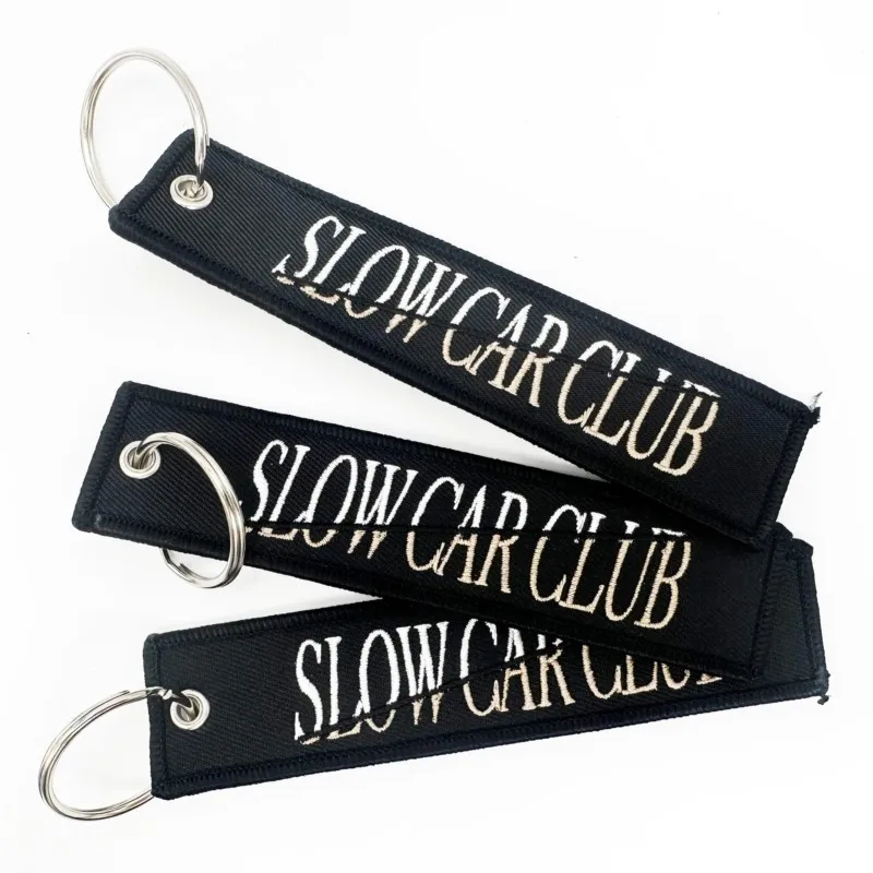 

Personalized customization Promotional gift Fabric keychain custom cheap quality embroidery jet tag keychain woven keychain