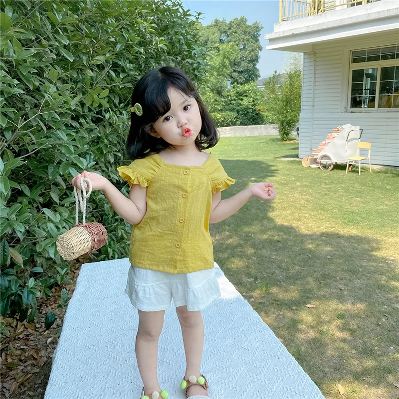 

Childrens Sets Summer New Korean 2024 Clothing Girls Doll Square Collar Flying Sleeve Shirts Short Sleeved 2024 Solid