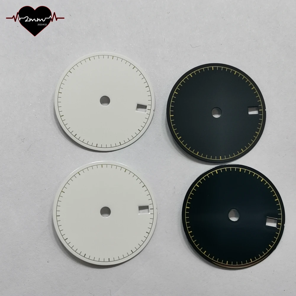 Glossy Matte Black Watch Dial with Gold Accents and Date Window