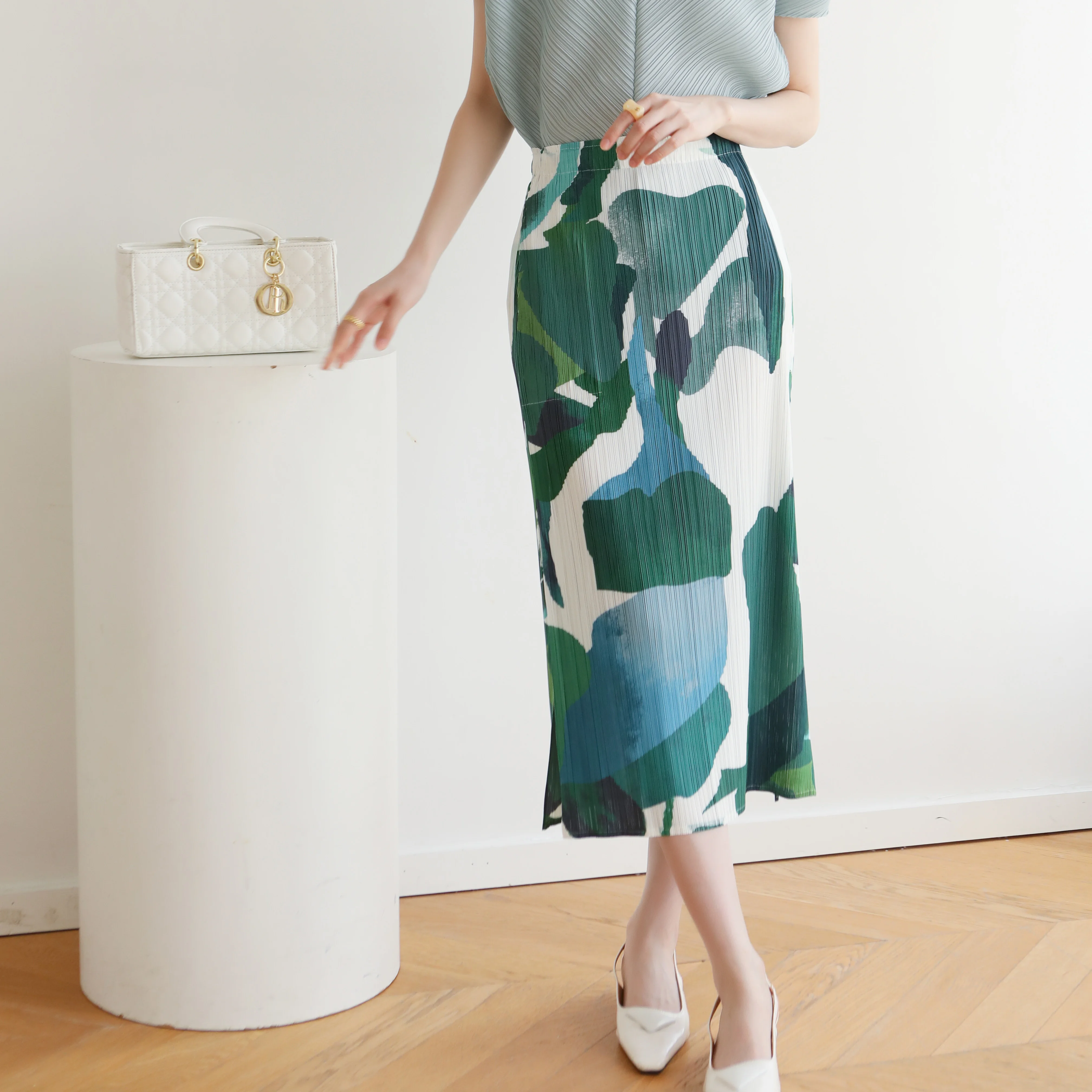 Counter Quality 2023 Summer Miyake pleated Commuter Slimming medium length double slit ink print skirt medium length skirt folding fresh and sweet pressed pleated turtleneck short shirt high waist slit midi skirt fashion skirt set