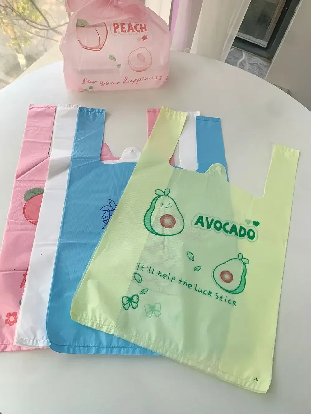 100pcs 0.04mm Thin Fruit Pattern Packaging Bag Blue Cartoon Panda Plastic Handbag Disposable Takeaway Pink Blue Packaging Pocket 3