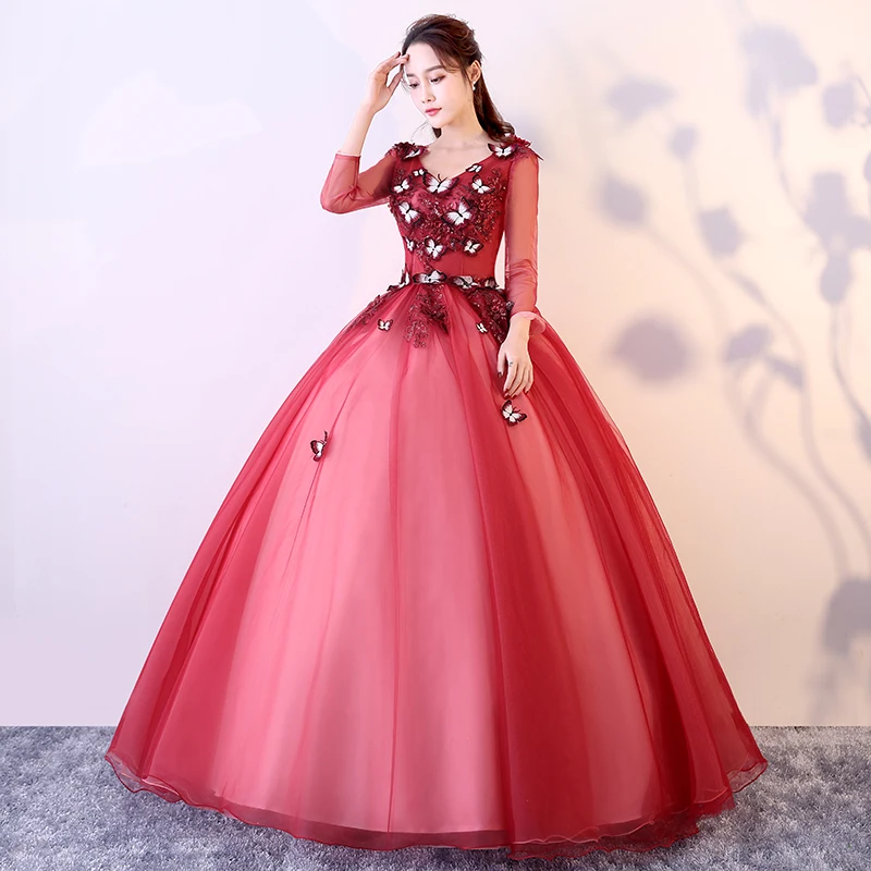 

Fashion Butterfly V-neck Burgundy Quinceanera Dresses Lace Illusion Flowers Tulle Ball Gown Long Sleeves Floor-length Vestidos