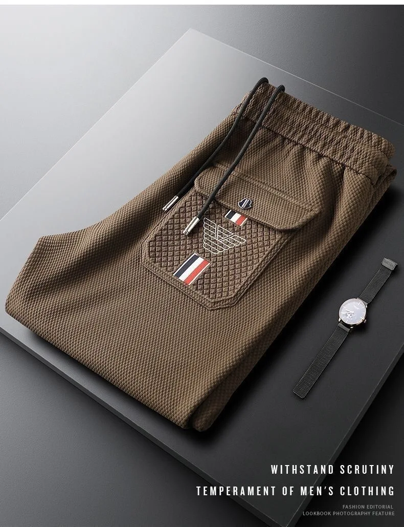 Description Picture 4 of itemEuropean luxury brand casual pants men spring New high end waffle elastic waistband with drawstring pocket embossed sports pants