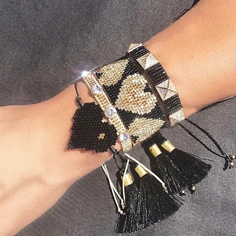 

Rice bead bracelet Heart-shaped Design Fashion Hand knitting Multilayer Bohemia Simple Rivet Black Beaded bracelet set