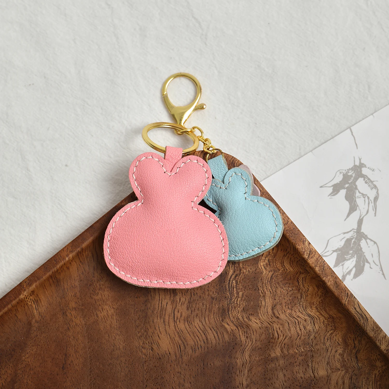 Decorative leather bag charm styling shot