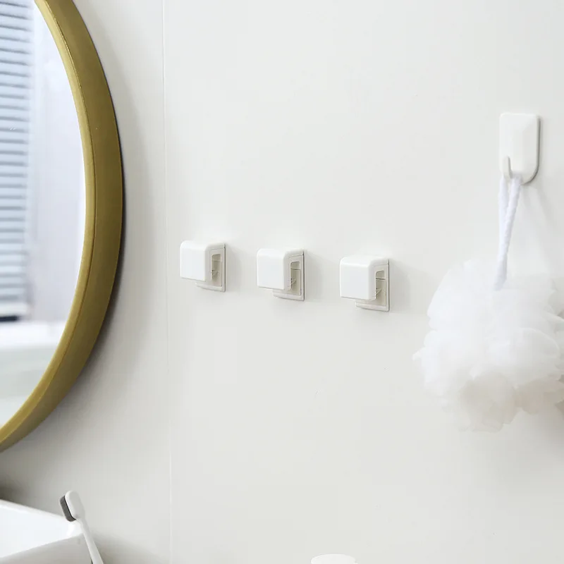 

Non-marking Bathroom Hanging Clip Multi-purpose Toothpaste Cleanser Rack Plastic Toothpaste Storage Clip Toothpaste Holder