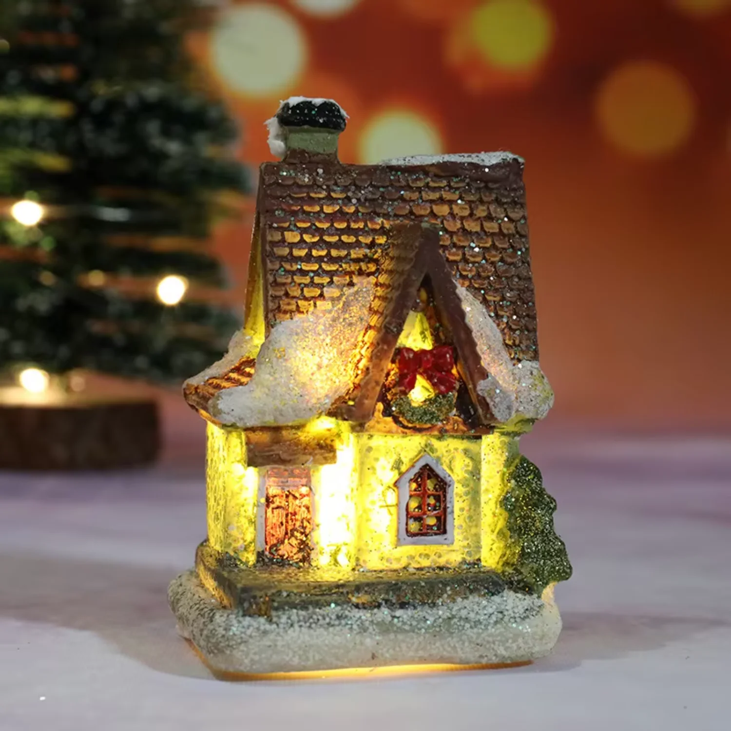 thumbnail image 1 of Estatuas de decoración musical LED de Papá Noel que rebotan iluminan una pequeña casa para Navidad, resina, luz LED blanca cálida para fiestas, bolas de cumpleaños, 1 of 5