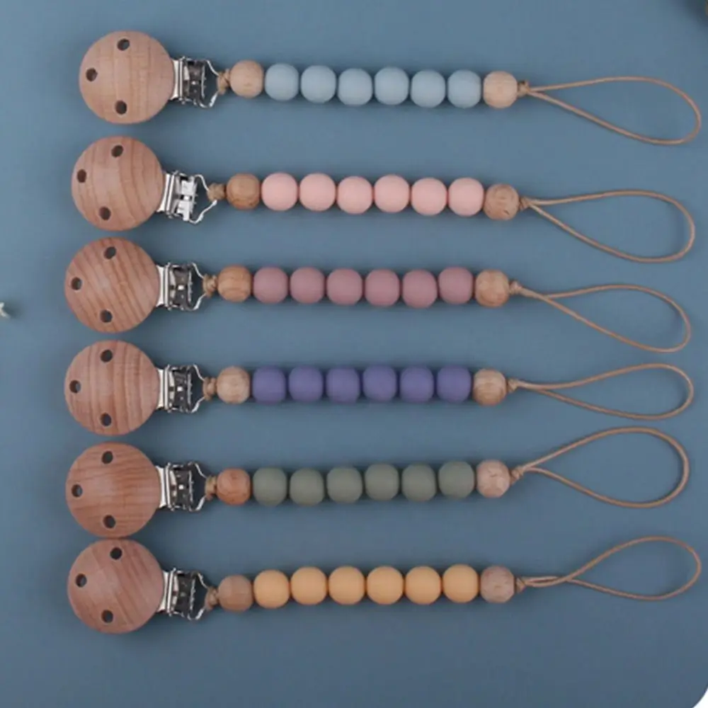 

Useful Safety Food Grade Beech Wood Wooden Multi-color Silicone Pacifier Clips Chains Nipple Holder Baby Pacifier Chain
