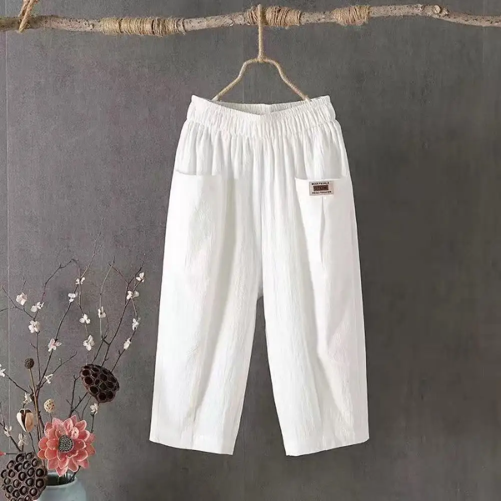 Women Summer Cropped Pants Mid-rise Elastic Waistband Wide Leg Casual Pants Solid Color Pockets Design Harem Trousers