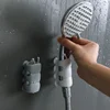 Sucker Shower Head Holder Reusable Shower Bracke Movable Suction Cup Caterpillar Shape Rack Bathroom Accessories 1