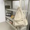 E8FB Trendy Canvas Drawstring Backpack Large Capacity School and Travel Bag for Teens and Adults Solid Color Daypack Book Bag 4