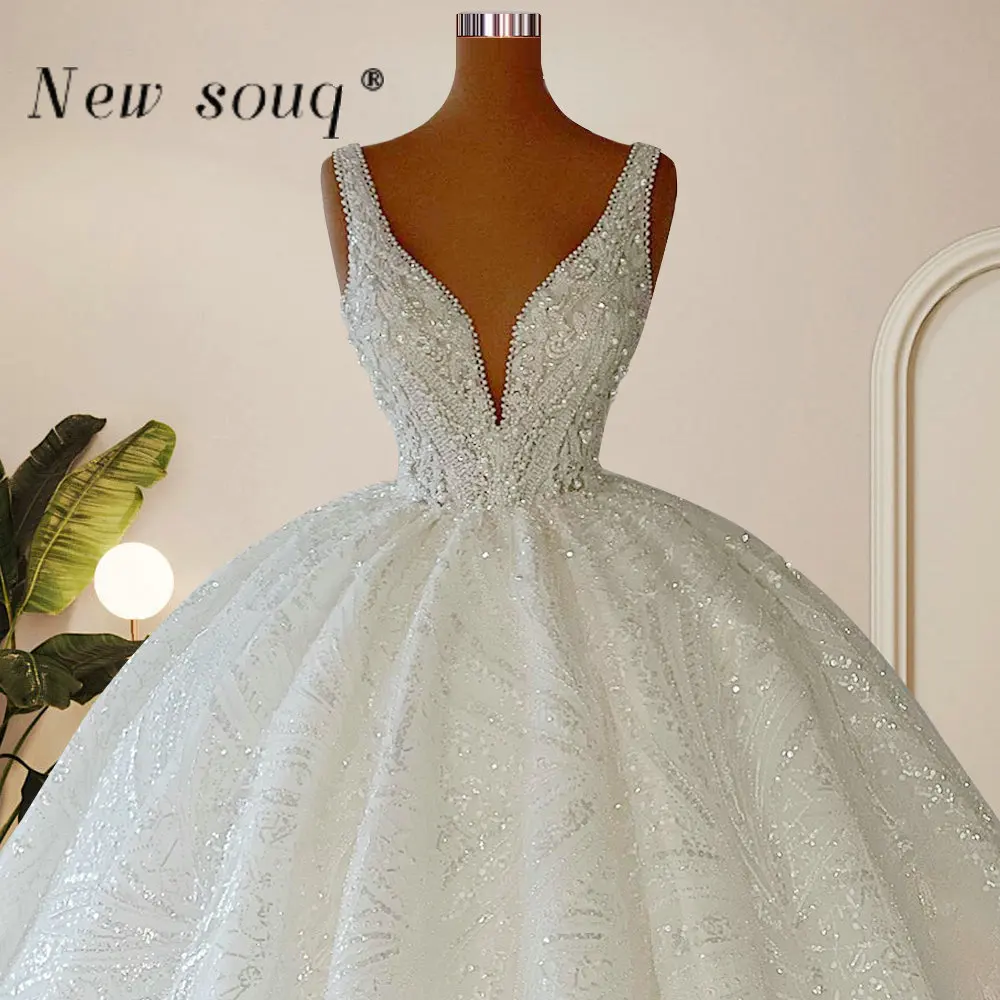 

Dubai Luxury Beaded Sexy Deep V Neck Ball Gown Wedding Dresses 2023 Sparkling Princess Puff Sleeveless Bridal Gowns Custom Made