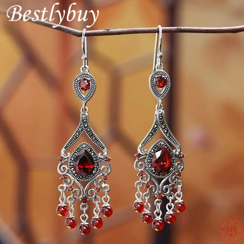 

Женские серьги-подвески из серебра 2023 пробы с гранатом