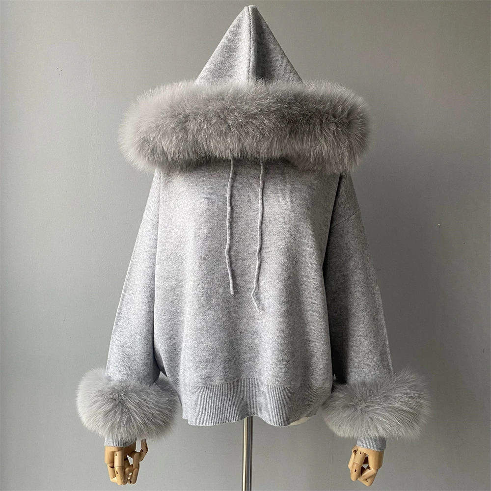 Removable faux fur collar detail on hooded sweater