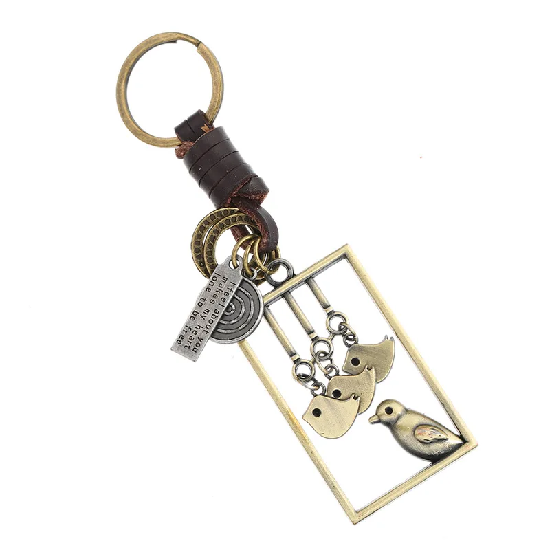 

Retro hand woven cowhide keychain alloy bird pendant car key pendant