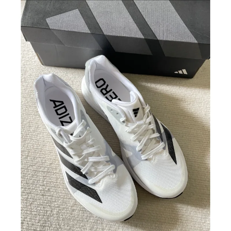 حذاء أديداس Adizero RC 4 للجري للجنسين باللونين ال...