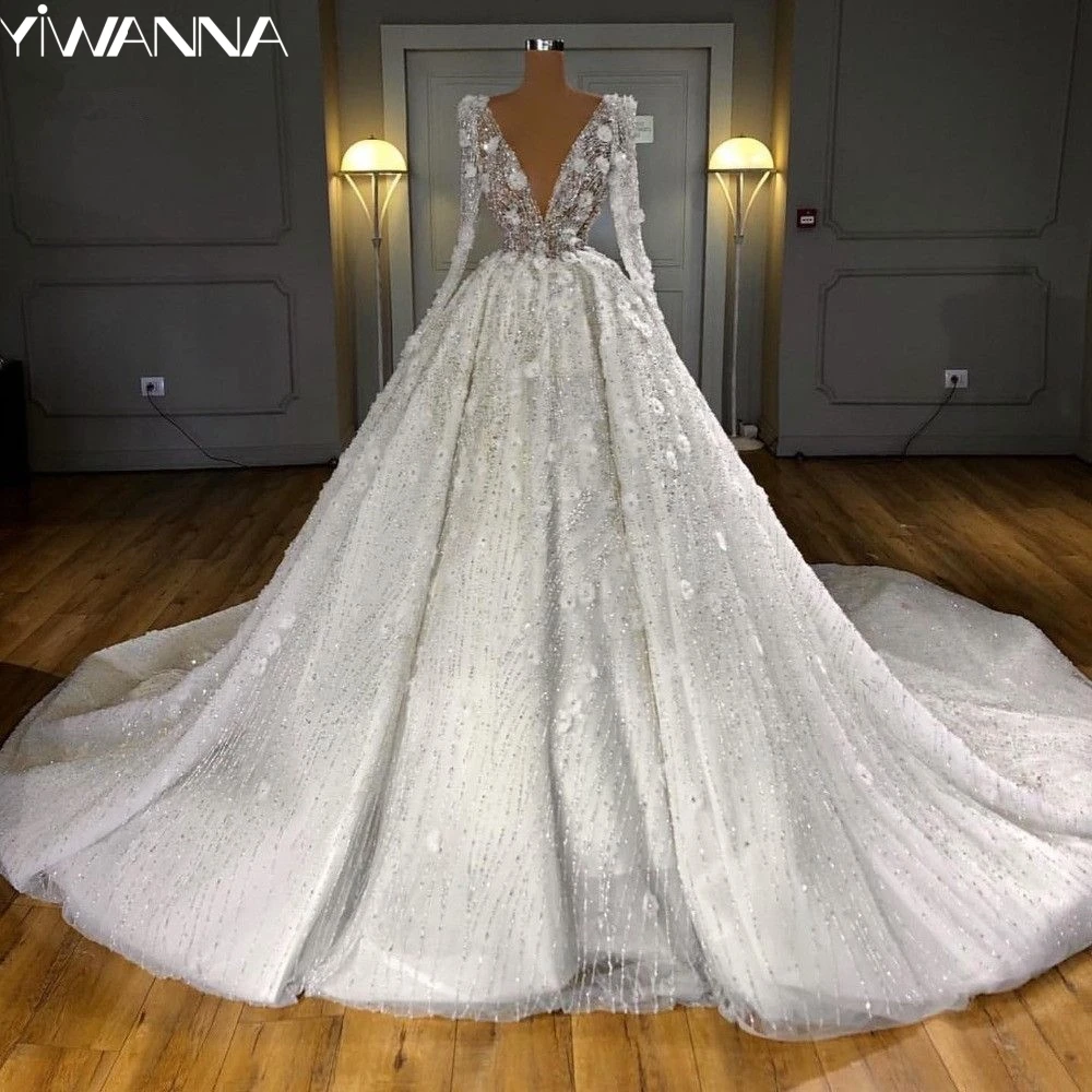 Stunning Wedding Gown with Deep Neckline and Floral Accents #CDTY01