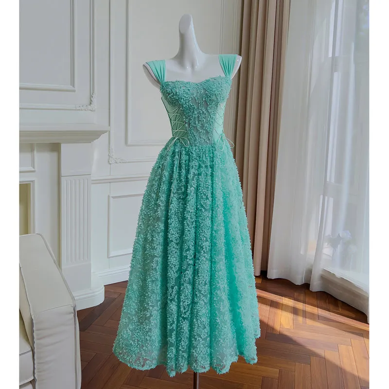 

Party dress with green flower appliqués, square neckline, barefoot back, sleeveless, lace, bandage, ankle length, prom dress