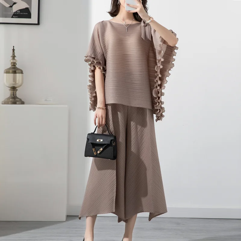 

Miyake Pleated Fashion Suit Women's 2023 Summer New Loose Covered Round Neck Bat Sleeve Temperament Wide Leg Pants Two-Piece Set