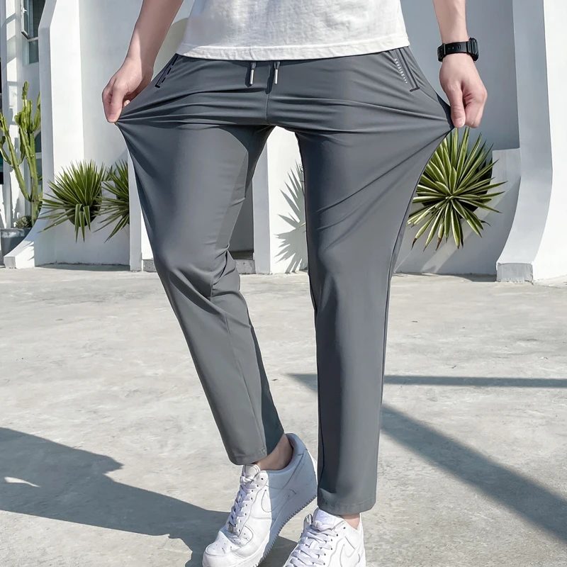New Couple Ice Silk Quick-Dry Pants Summer Thin Adhesive Zipper Pocket Stretch Breathable and Loose Outdoor Sports Trousers