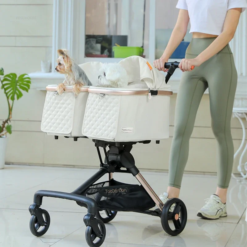 Cochecito ligero y multifuncional para perros y gatos pequeños.