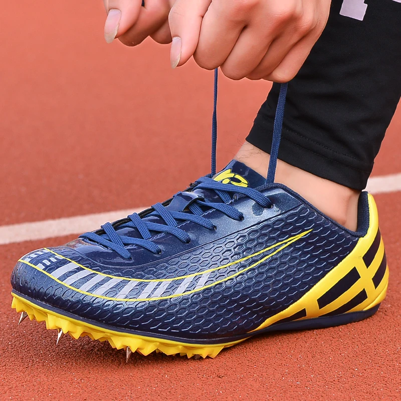 Men Track Field Shoes Spikes Running Training Nails Race Shoes Professional Light weight Soft Waterproof Long Jump