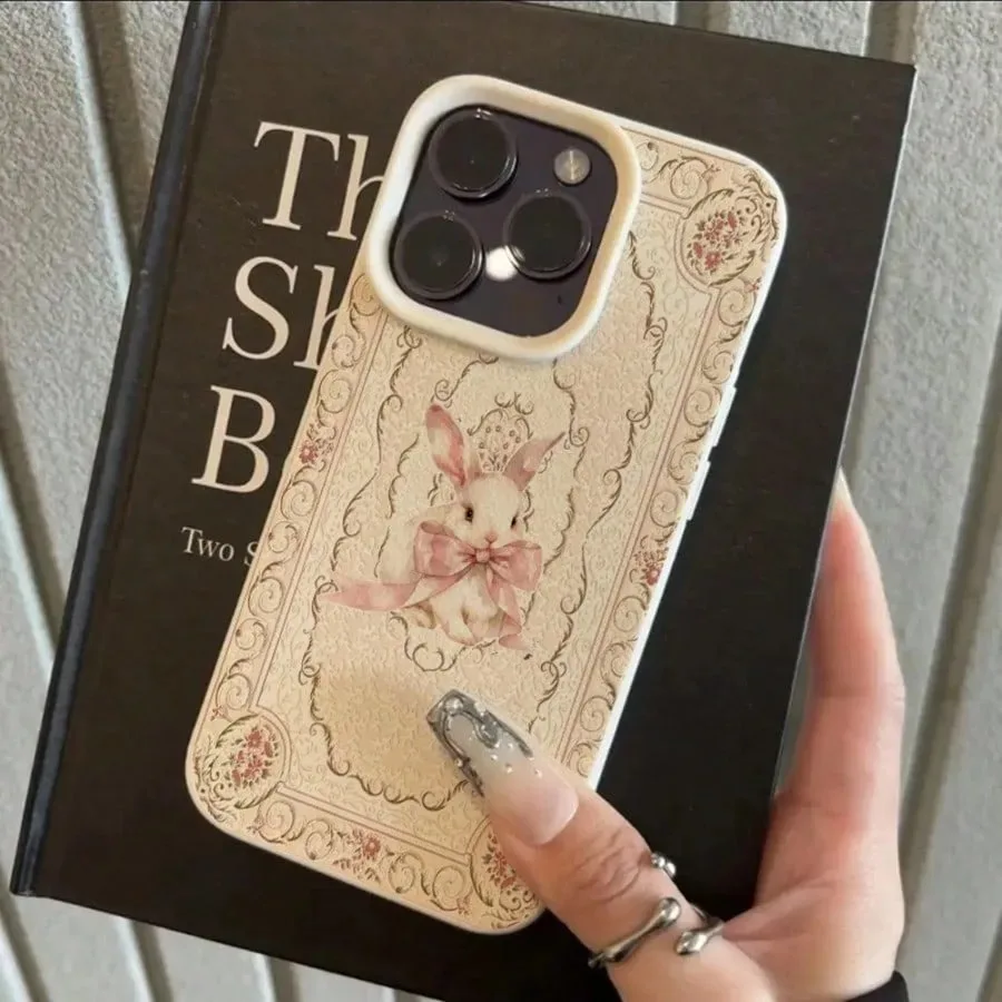 รูปสินค้า เคสโทรศัพท์ TPU ลายกระต่ายโบว์ชมพูหวาน ปกป้อง iPhone ได้ทุกรุ่น