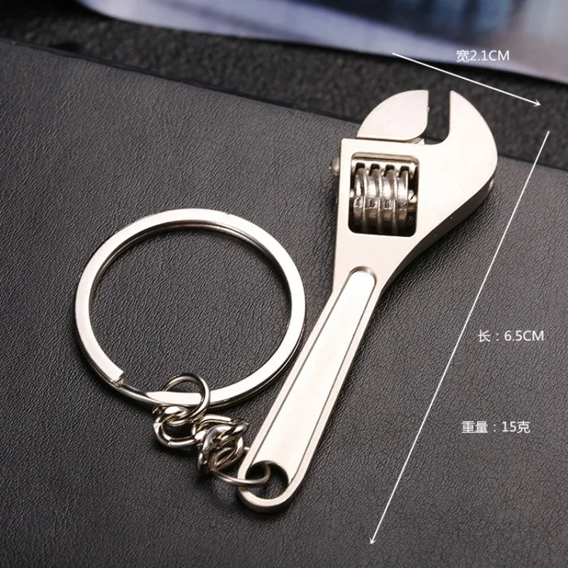 Portachiavi da uomo per auto e borsa, strumento combinato portatile da esterno, mini multiutensile tascabile con righello, martello, chiave inglese, pinze e pala - immagine 6