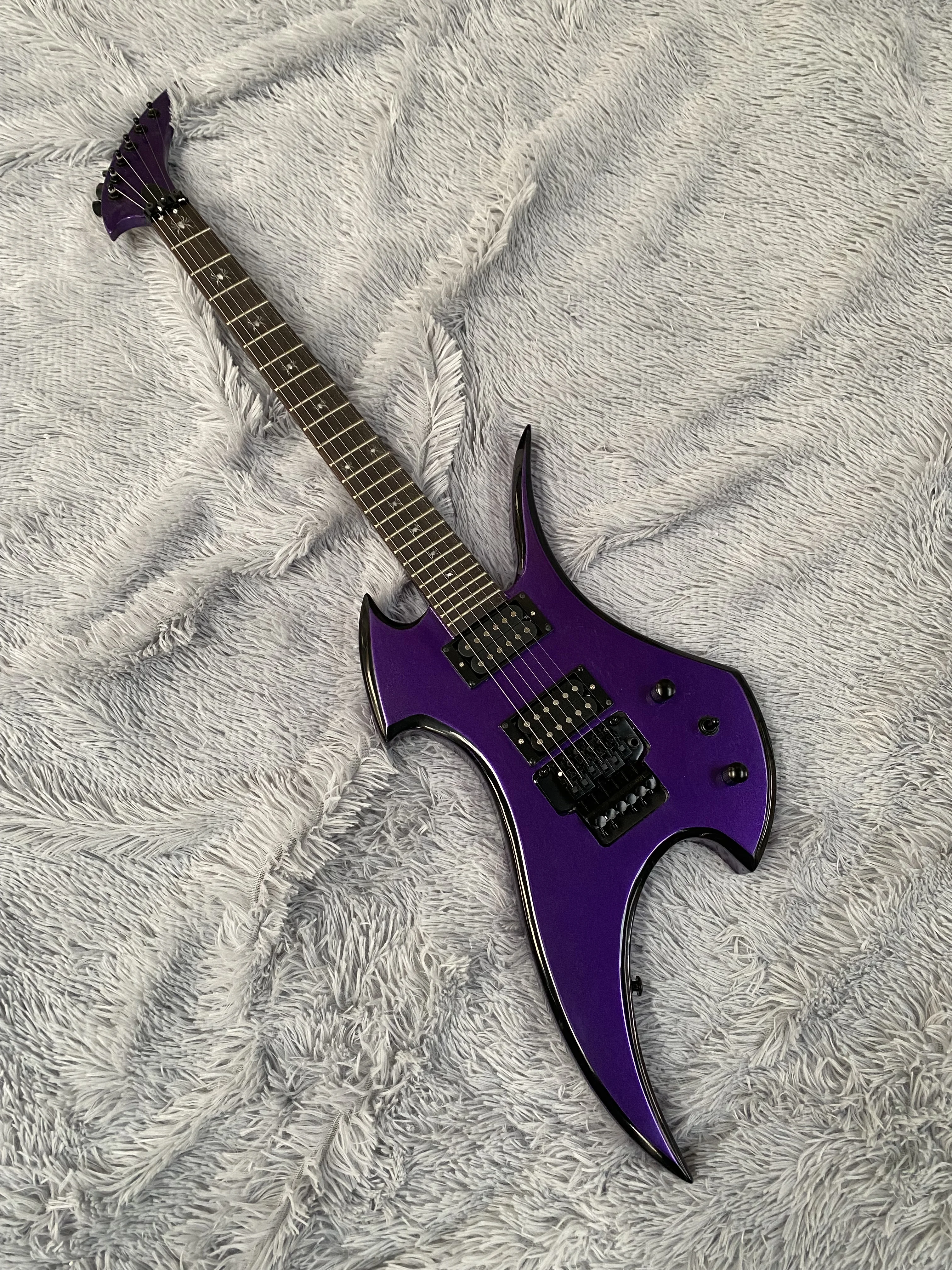 

High quality electric guitar, personality styling, tremolo system, fretboard spider inlay, free shipping