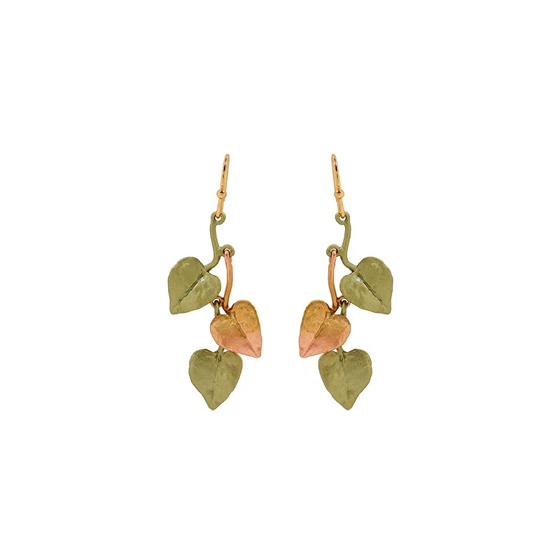 

European and American designers share the same and fresh heart-shaped leaf with mid length earrings featuring multiple pendants