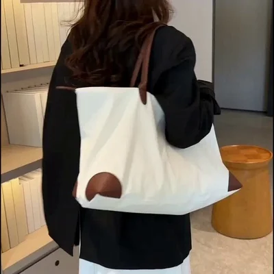 

2023 New High end Portable Travel Dumpling Bag Fashion One Shoulder Large Capacity Mommy Bag