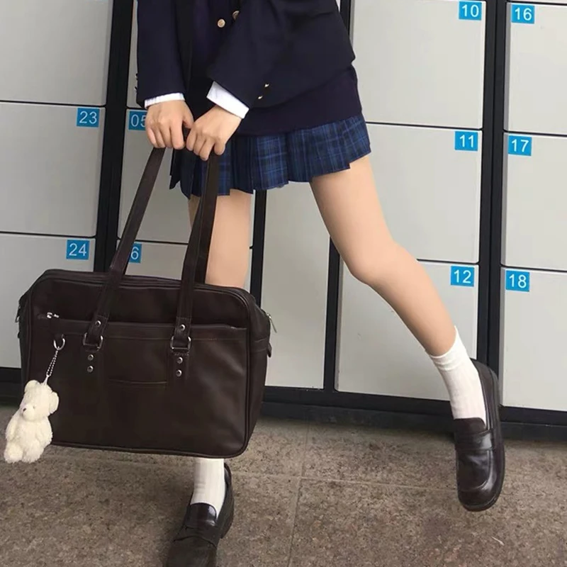 Leggings being worn with dress in winter setting