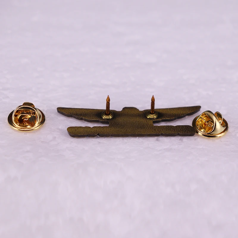 Eagle wing brooch on jacket