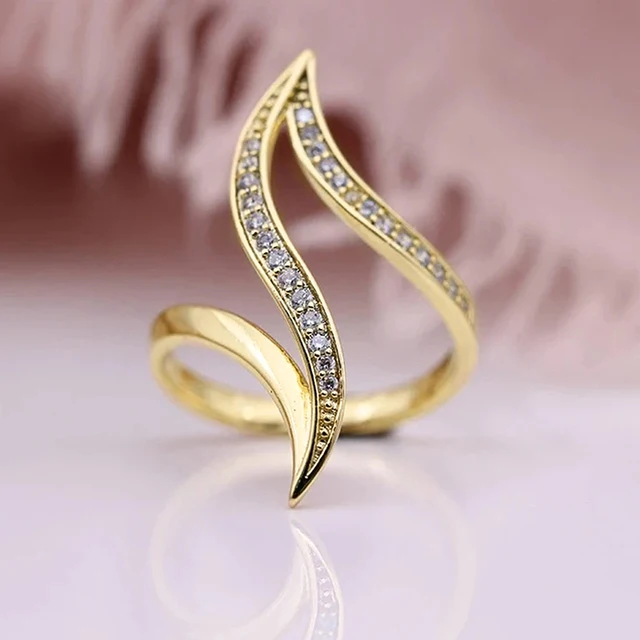 Huitan Hyperbole Marquise en forme de couleur or anneaux pour les femmes entièrement pavé éblouissant CZ nouveaux accessoires de bande de mariage à la mode bijoux