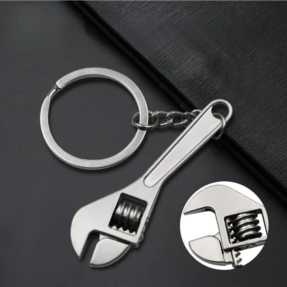 Compact Tool-Inspired Keychain Set: Creative Metal Car Keyrings with Adjustable Wrench Spanner - Mini DIY Gift Collection