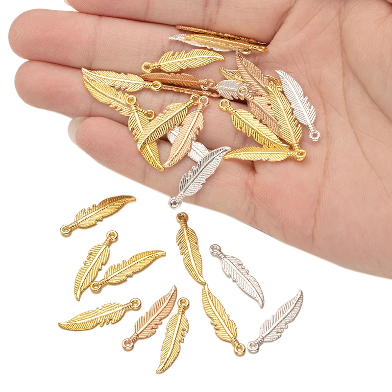 50/100pcs 금속 깃털은 DIY 수제 귀걸이에 대한 펜던트의 매력을 남깁니다. 목걸이 팔찌 쥬얼리 액세서리 결과 만들기