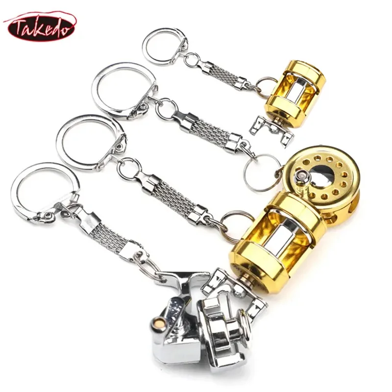 TAKEDO ST2 HOT SEAL Metal MINI Fishing Reel Keychain Car Keychain For Car Accessories Fishing Reel Shape