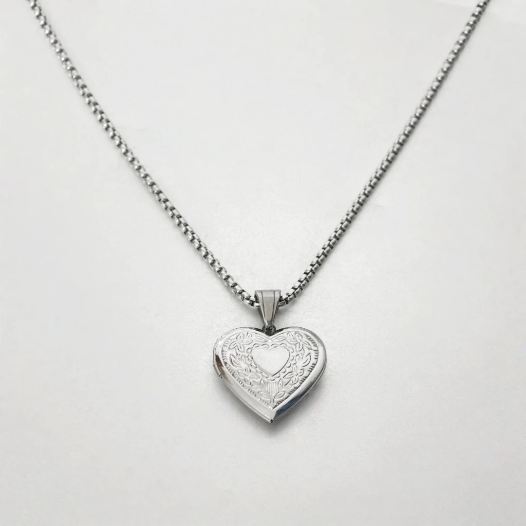 Heart locket close‑up highlighting polished surface
