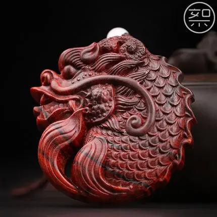 

Exquisite lobular red sandalwood fish dragon handle pendant