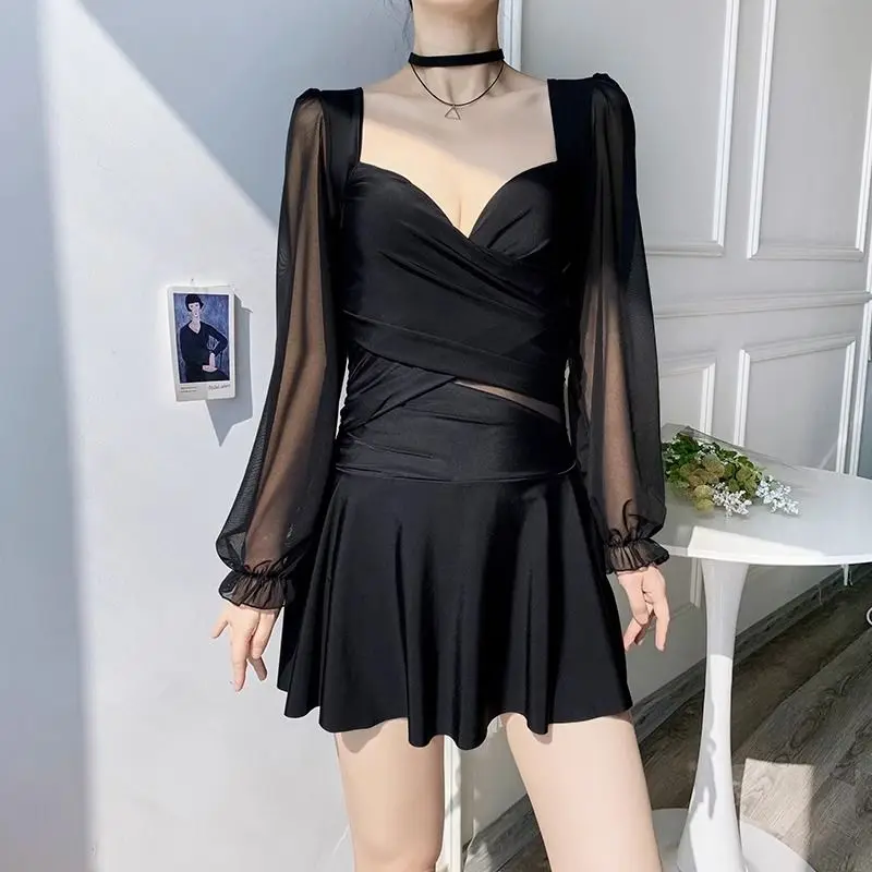 2023 New Summer Women's Conjoined Body Conservative Long Sleeve Steel Bracket with Chest Pad Solid Color Casual Ruffles Swimwear
