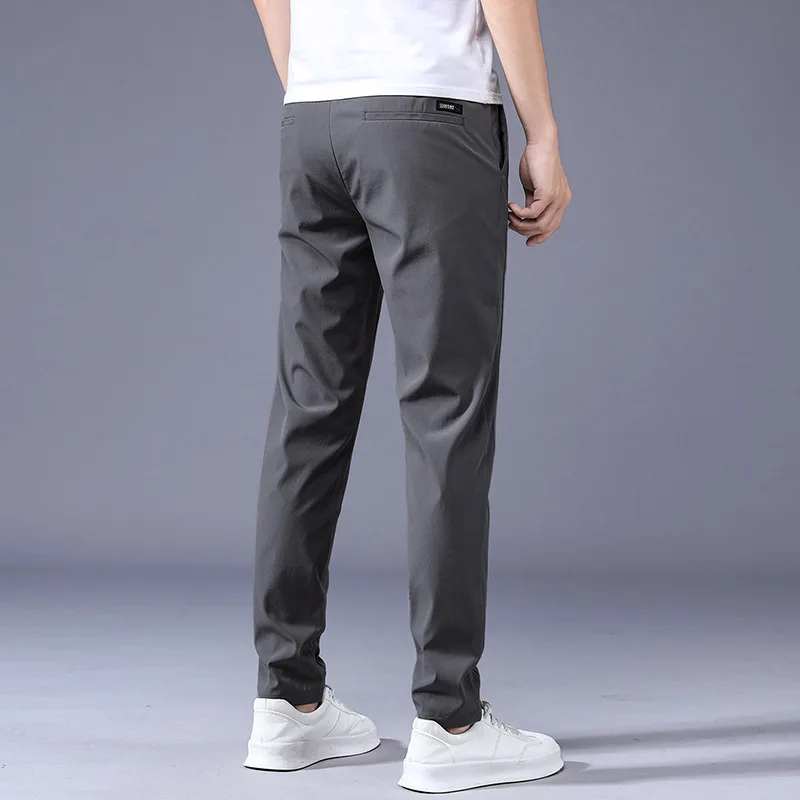 2024 Summer Ice Silk Thin Sports Pants Men's Straight Loose Elastic Non ironing Casual Pants Men's Work Wear Pants