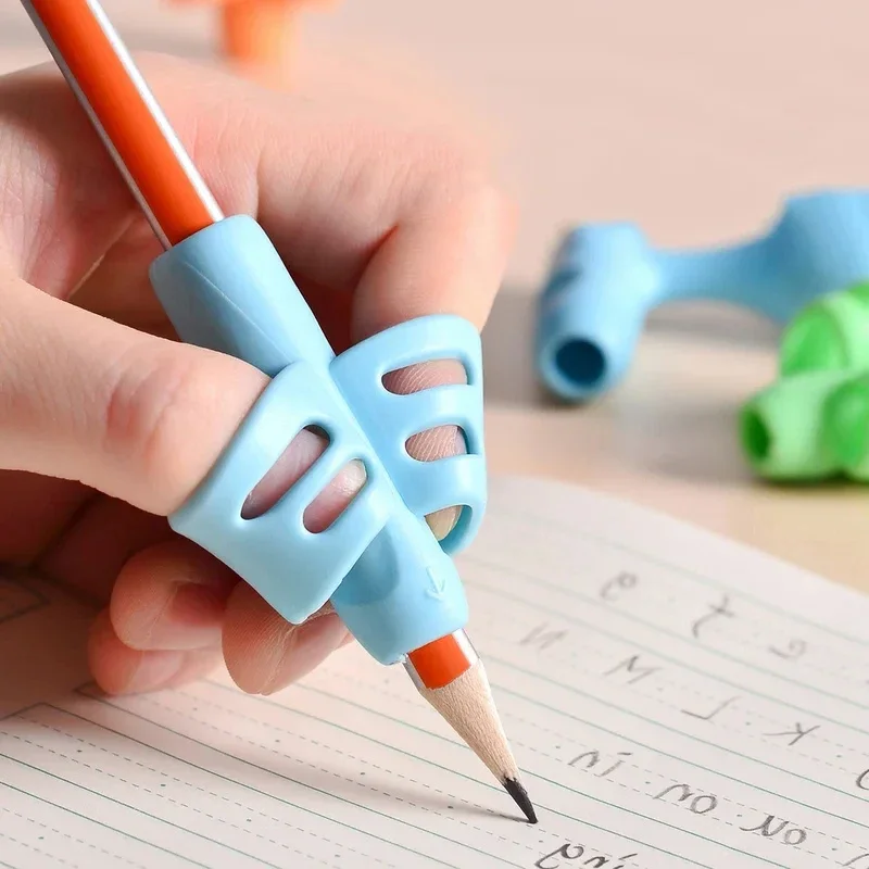 

1Pcs Children Writing Pencil Holder Auxiliary Grip Posture Corrector Child Spare Parts of Pens Fingers Guide Pen Trainer
