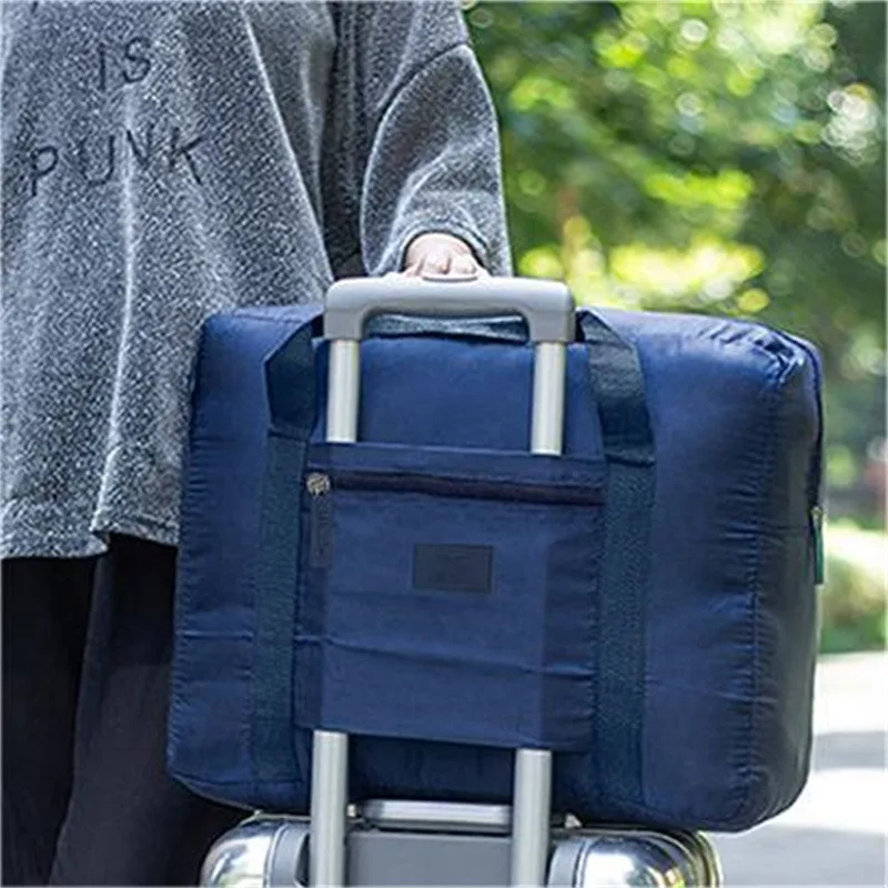 

New Fashion Waterproof Travel Bag Large Capacity Bag Women Nylon Folding Unisex Luggage Travel Handbags