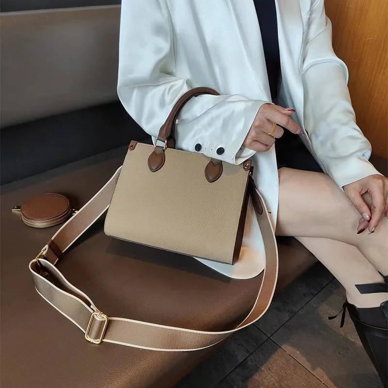 

Genuine leather's new high quality hand-held top layer cowhide Large capacity Commuter Tote Crossbody bag for women