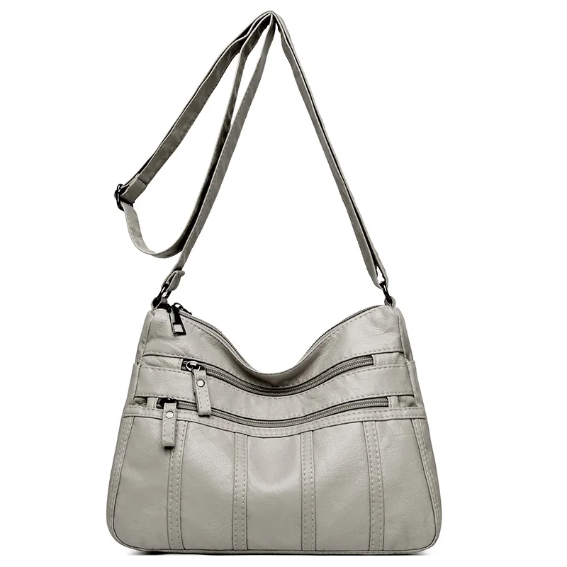 Sleek Black Crossbody Travel Bag with Adjustable Straps and Zipper Compartment