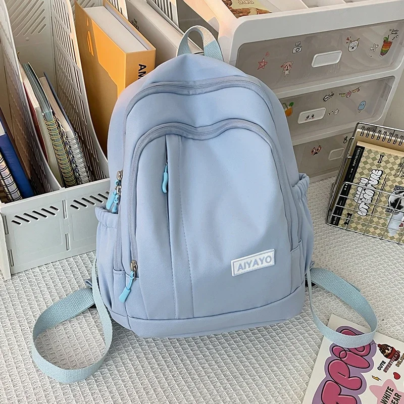 

Новинка 2024, женская сумка, нейлоновый материал, вместительный рюкзак для работы и отдыха, распродажа, высококачественный универсальный студенческий рюкзак