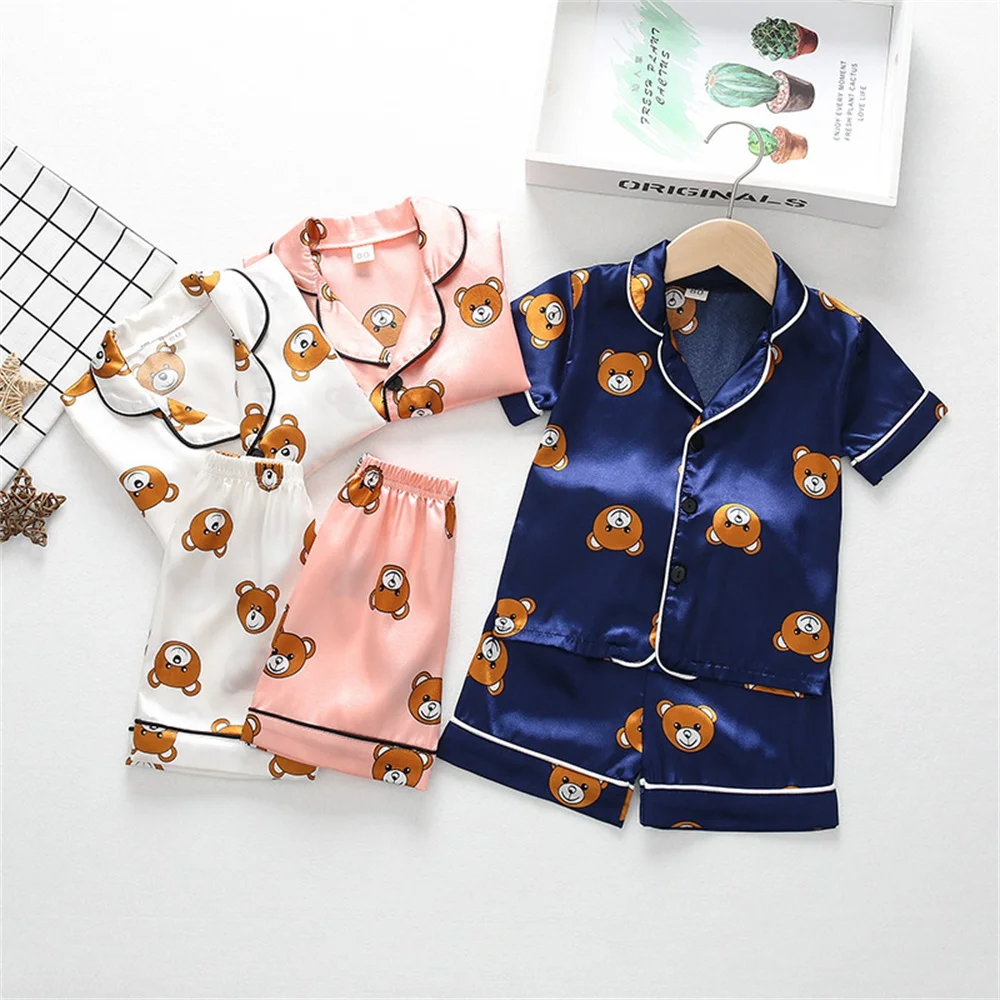 

2024 Children's Summer New Clothing Summer Boys and Girls Pajamas Bear Cartoon Home Home Wear Short Sleeve Set Two Pieces